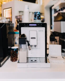 Refurbished DeLonghi Eletta Cappuccino In White ECAM44660W -Coffee Drink Store delonghi social lifestyle eletta white coffee n clothes event all rights jan 2099